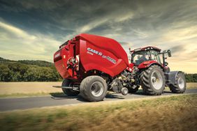 The Case IH R456 round baler attached to a Case IH tractor.