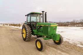 John Deere 4440 in the snow