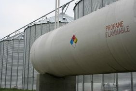 Propane tanks by grain bins