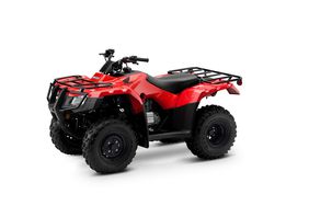 The Honda FourTrax Recon ATV 2023 model in red.