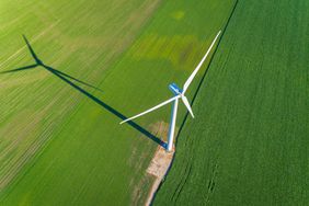 Wind turbine in a countryside corn field