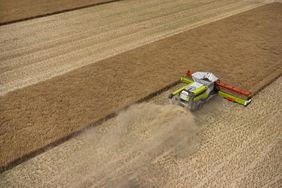 The updated Claas Lexion 8000 series combine in the field.