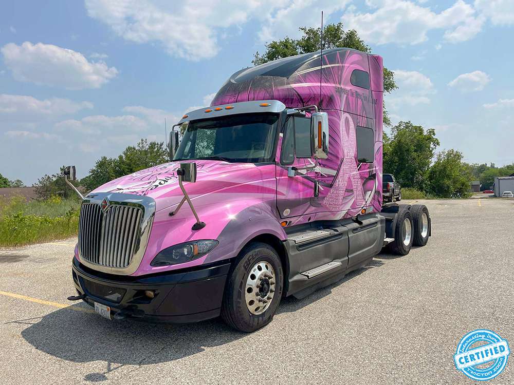 The pink International ProStar semi truck