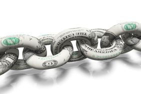 Chain links covered in U.S. $1 bills 