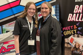 Bayley Ballenger poses with her mom, Cindy, by Bayleyâs racecar. Bayley has been racing sprint cars since she was 14.