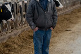 Brad Kruger standing in a barn