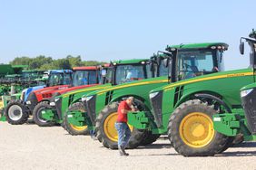 checking out used tractors at dealer lot