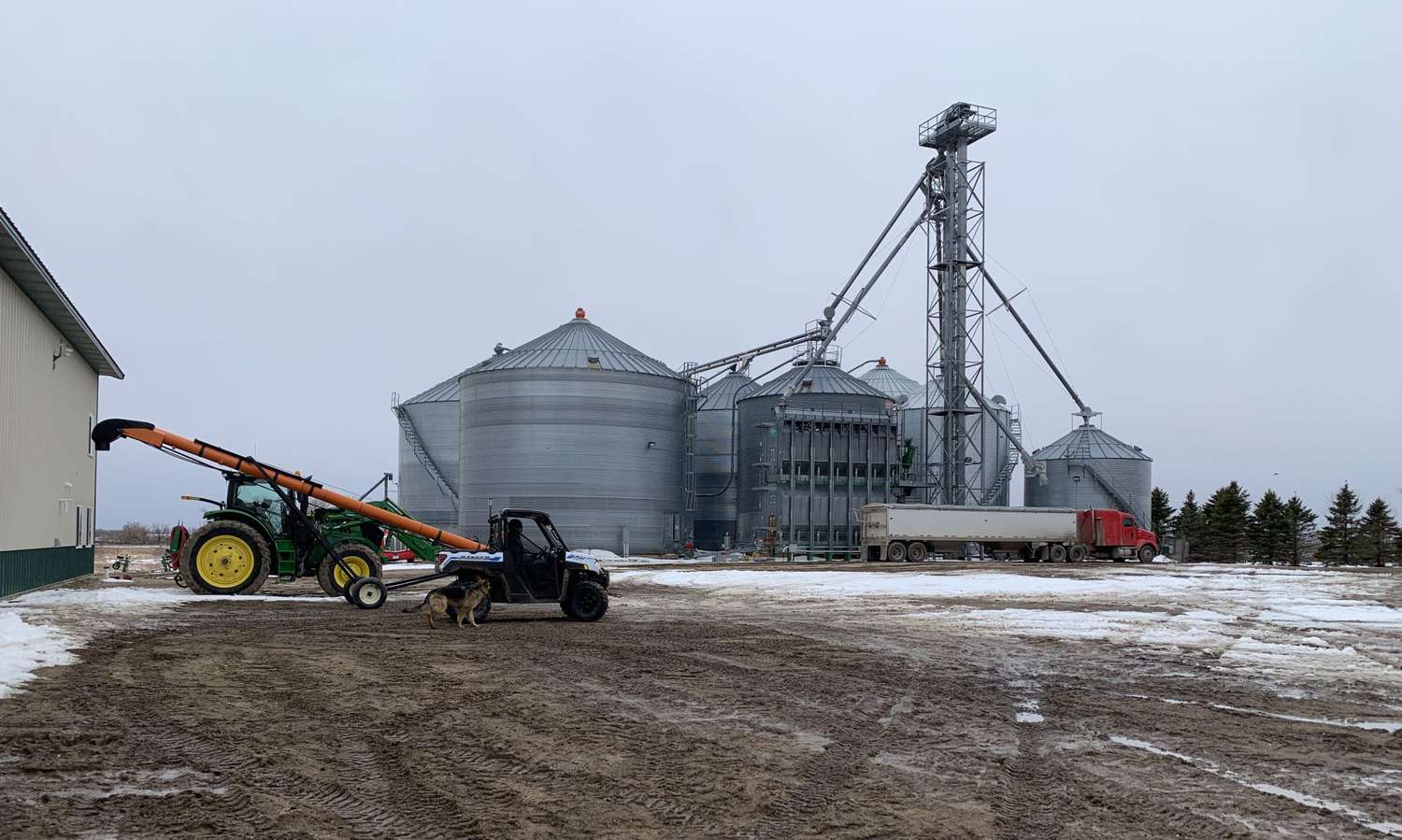 Zach Johnson's Minnesota farm yard in April with mud and snow