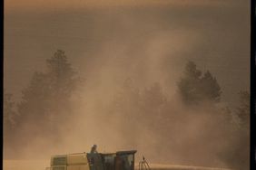 Combine in a dusty field