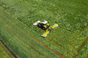 The Claas Disco 9300 Trend mower in a hay field.