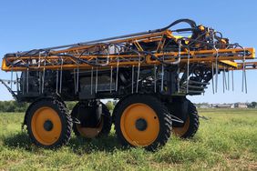 A tractor made by John Deere in partnership with Montag Manufacturing looks like a crop sprayer but seeds cover crops instead