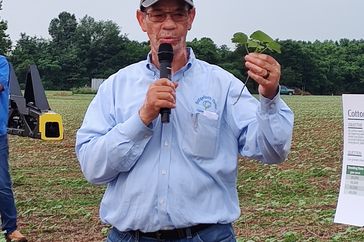 Bill Bridgeforth shares insights about cotton seeding rate field research conducted on his farm at a recent NBGC Model Farm tour in Tanner, Alabama.