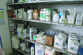 Pesticides stored on shelf.