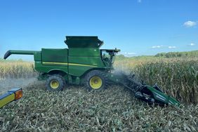 John Deere combines corn in September on a North Carolina farm