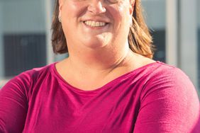 Karen Jones wearing a pink shirt