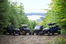 The new line of 2021 Commanders from Can-Am displayed in a wooded scene