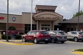 Three cars parked outside the Scotland County Hospital in rural Missouri