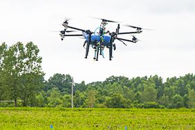 drone spraying weeds