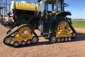 Tractor fitted with narrow tracks