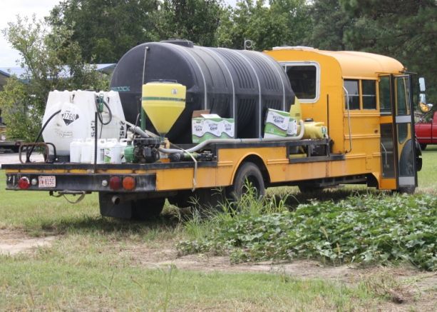 school bus carrying water tank