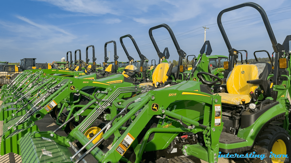 A line-up of low-horsepower John Deere tractorz