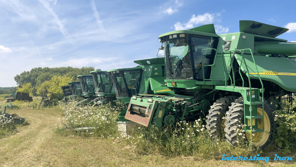 John Deere combines in the dealership "boneyard."